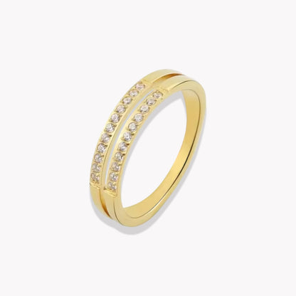 A gold-colored double layer ring with small embedded stones, displayed against a white background.