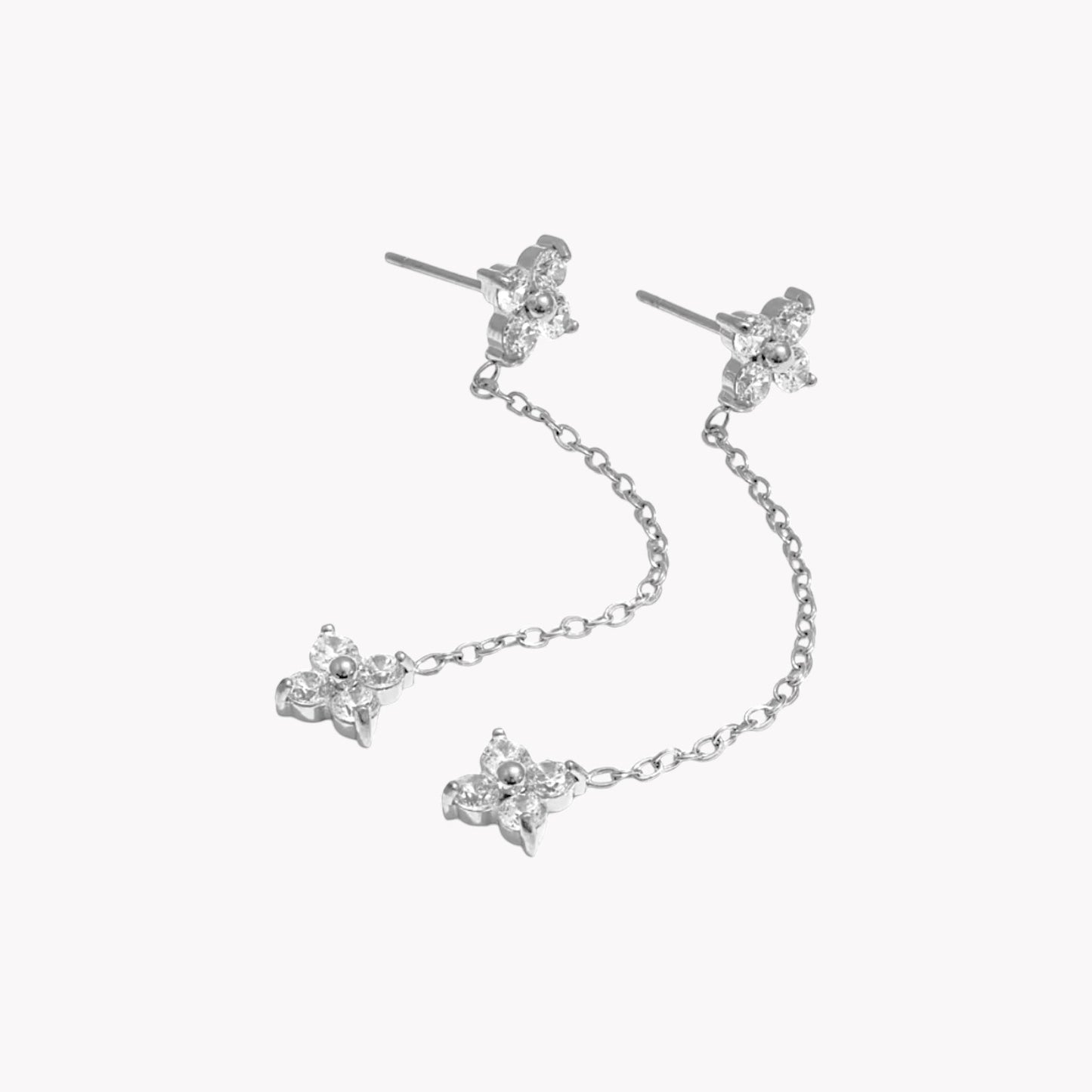 flower shaped gemstone on a long earring stud