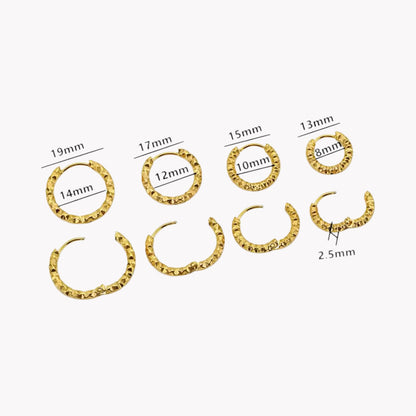 4 pairs of gold hooped earrings in different sizes, organised from biggest to smallest pictured on a white background