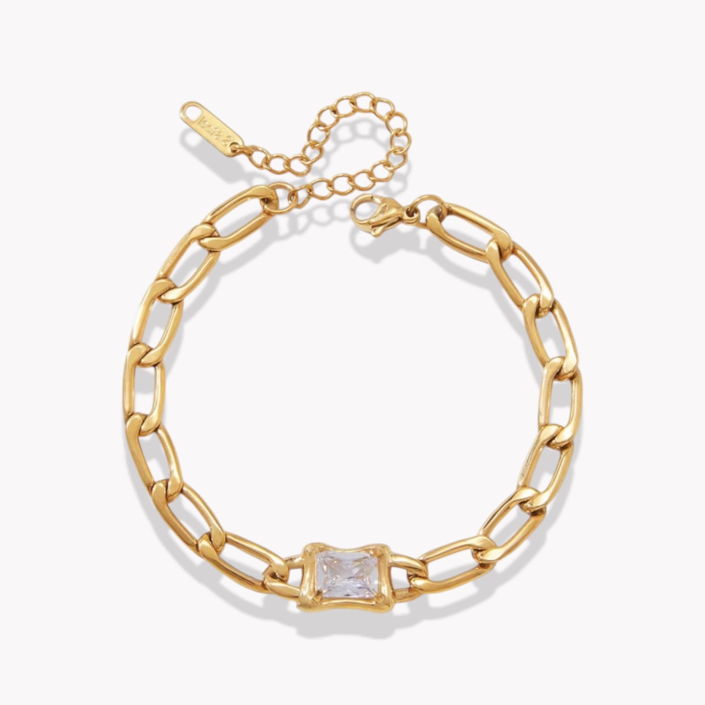 Gold chain bracelet with a central square gemstone on a white background