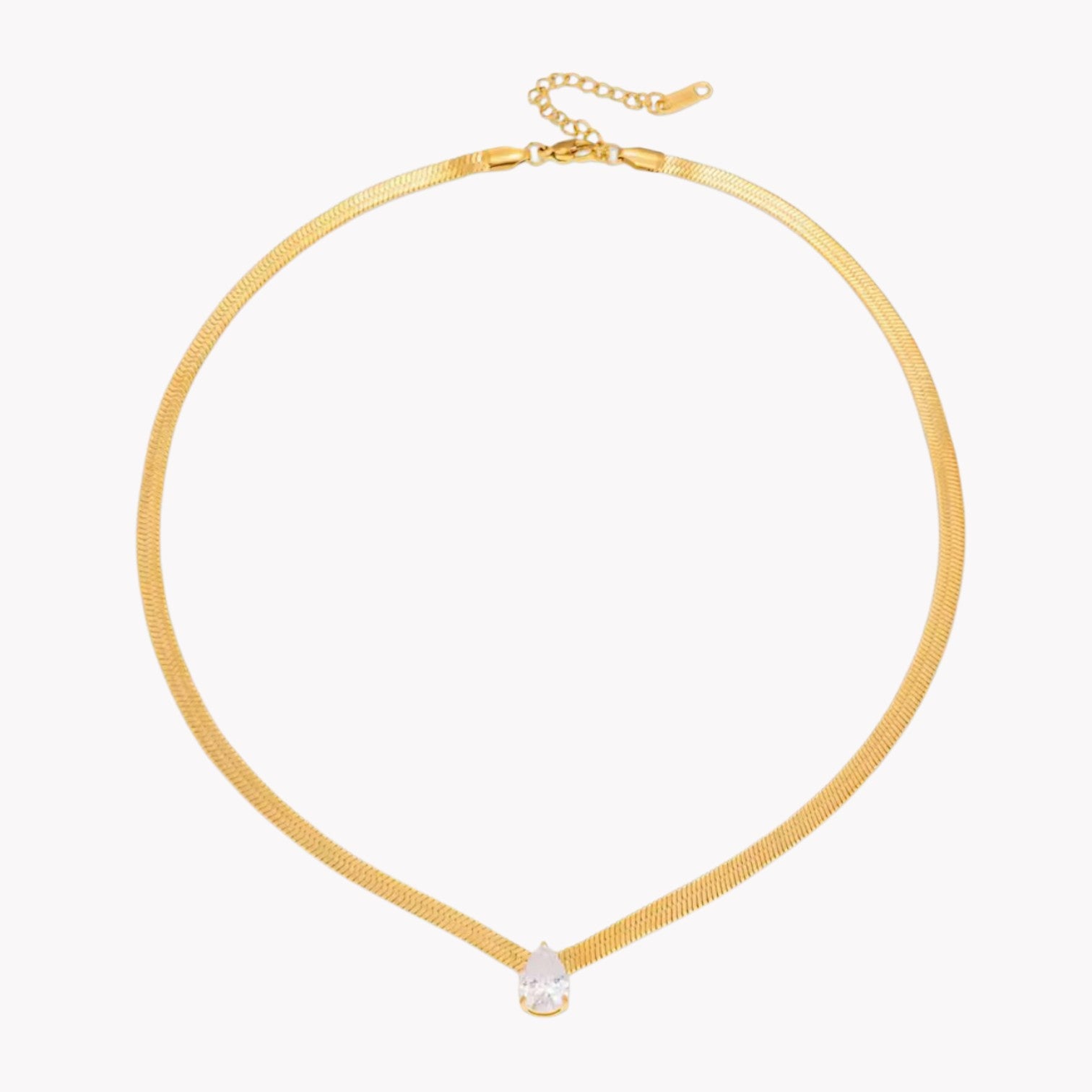 Gold necklace with a small pear pendant on a white background