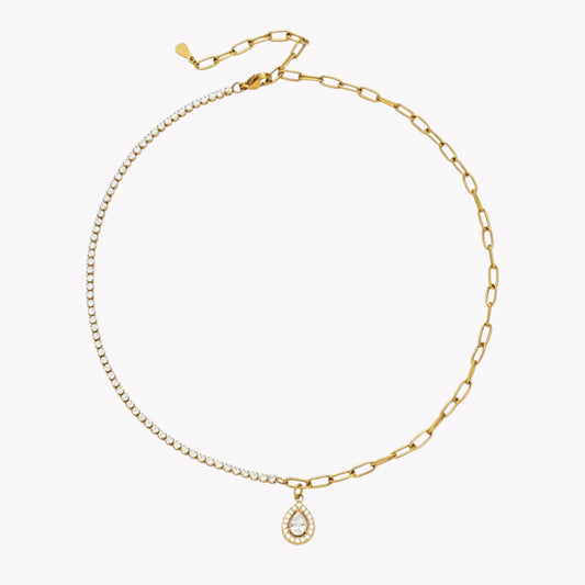 A gold chain necklace featuring a dual-design split between a delicate round-bead chain and a larger paperclip-style chain, with a teardrop-shaped pendant studded with small clear crystals.