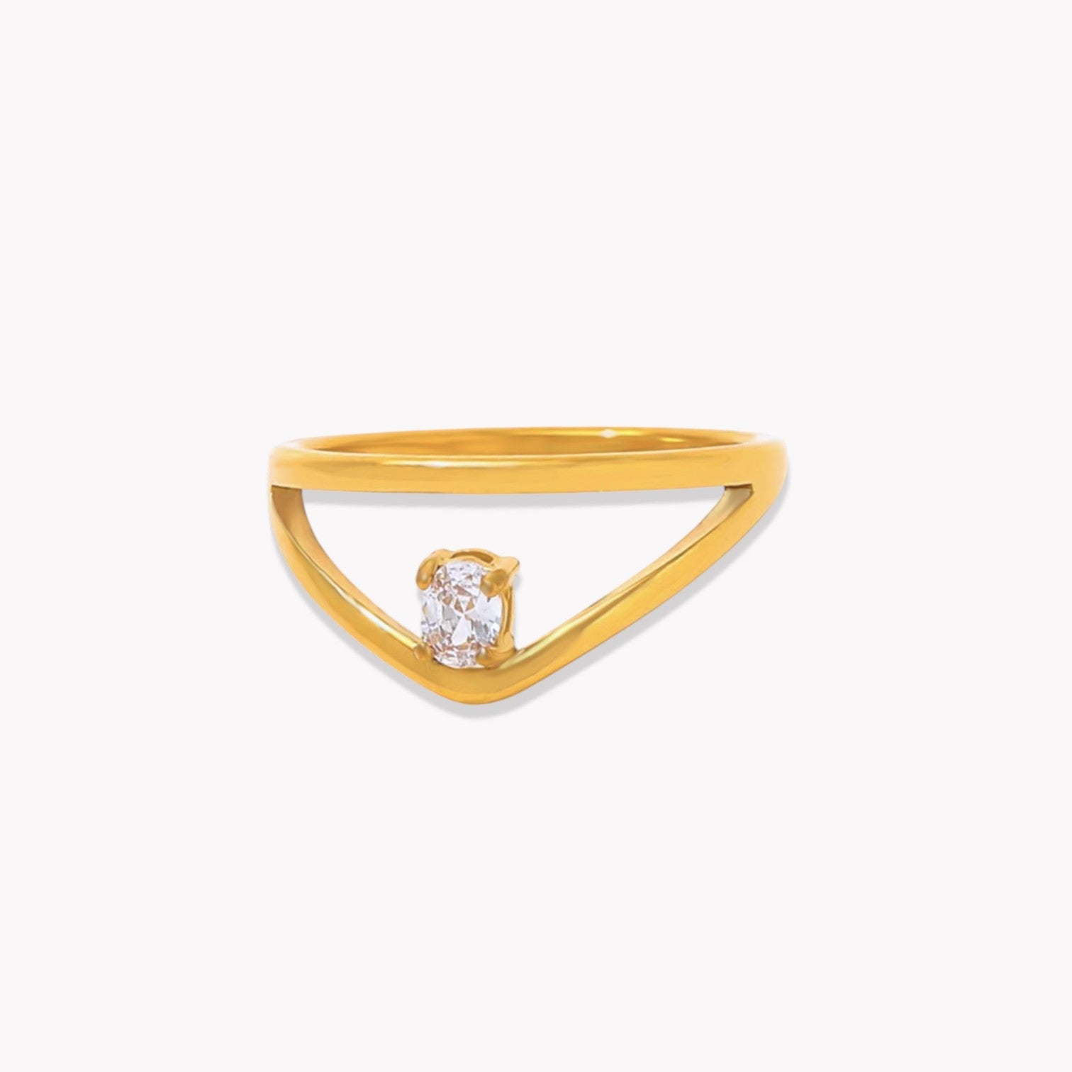 Gold ring with a diamond on a white background