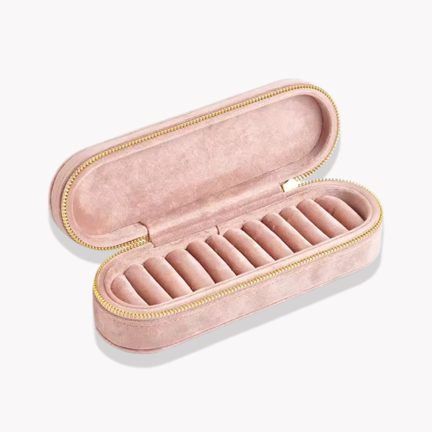 Pink jewelry box with gold zipper on a white background