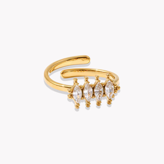 Gold adjustable ring with embedded marquise stones on a white background