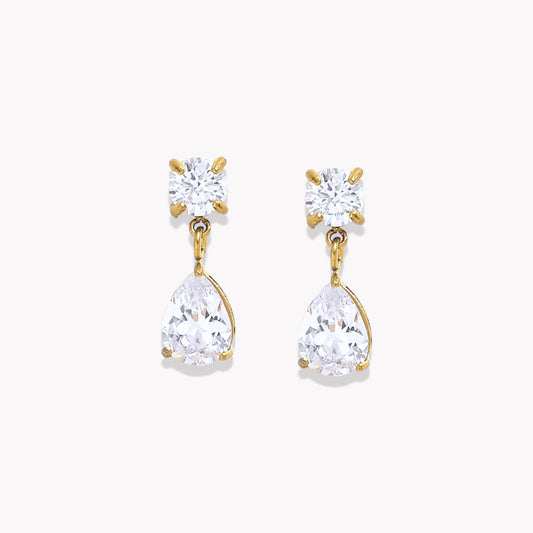 Gold earrings with clear teardrop-shaped gemstones on a white background