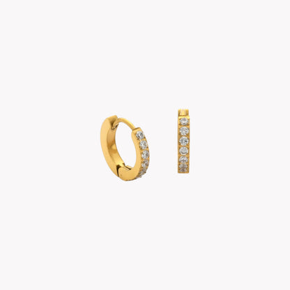 Gold hoop earrings with embedded stones on a white background