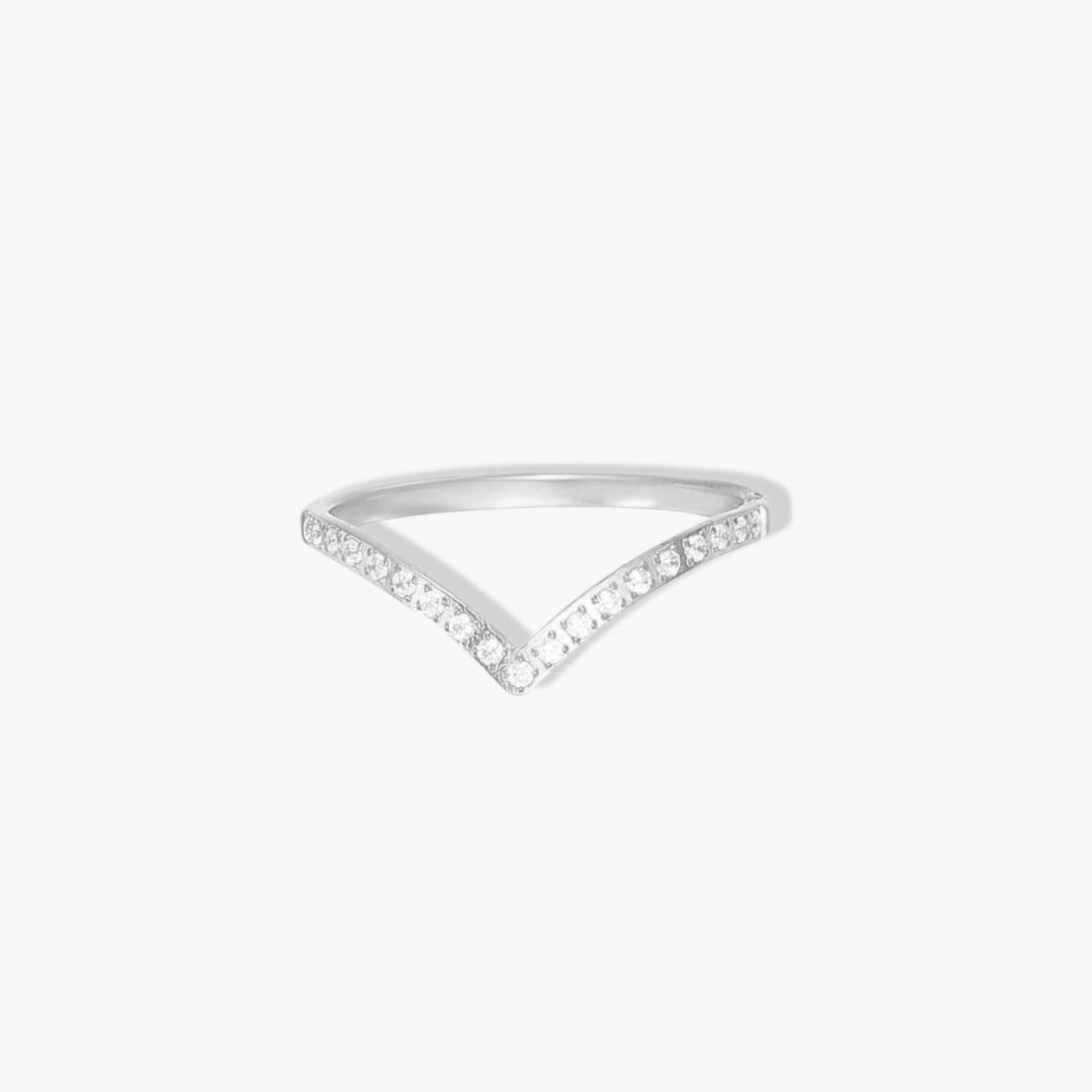 Silver wishbone ring with small clear gemstone detail along the band. Pictured on a white background