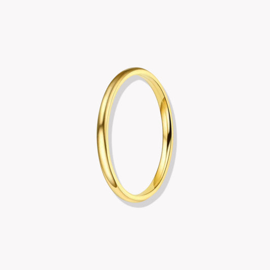 Gold ring on a white background